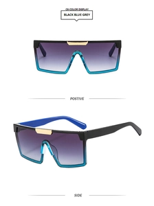 Vue détaillée de lunettes de soleil carrées avec monture dégradée noir bleu et garniture