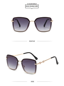 Detail of gold rimless oversized sunglasses with purple gradient lenses and hollow temple
