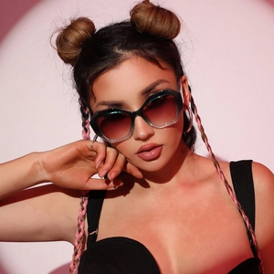 Chic geometric oversized sunglasses with dark green frames and gradient brown lenses