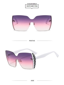Detail view of purple gradient rimless sunglasses with black and white checkered temples