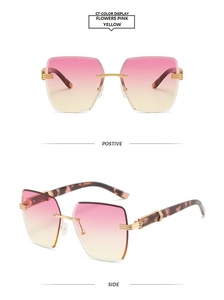 Detail of pink-yellow gradient rimless sunglasses with gold metal and tortoise temples