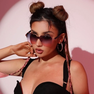 Fashionable oversized gradient pink Y2K rimless sunglasses with metal temples for women