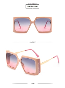 Detail view of pink square sunglasses with glitter temples and gradient lenses