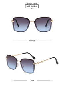 Detail view of gold frame square sunglasses with gradient grey blue rimless lenses