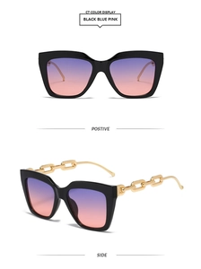 Détail de lunettes de soleil carrées avec verres dégradés et branches en chaîne dorée
