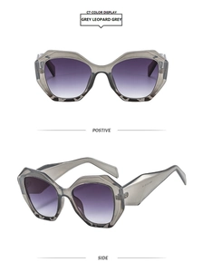 Detail view of geometric grey leopard frames with stylish gradient purple lenses