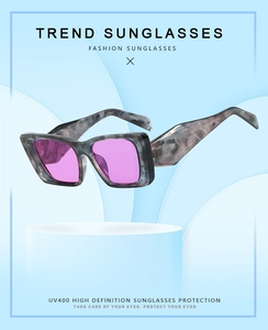 Detail of square marble pattern sunglasses frame with purple UV400 protective lenses