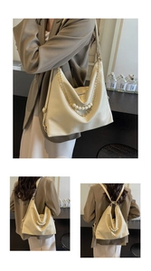 Détail du grand sac cabas beige avec chaîne de perles élégante et texture en simili cuir