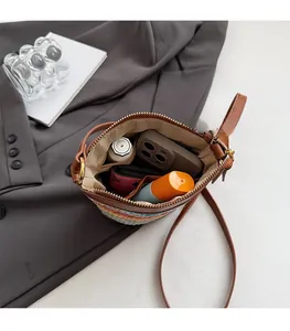 Top view of striped woven bag interior showing spacious storage for daily essentials