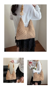Detail of bohemian woven straw bag with unique wooden bead handle and rustic texture