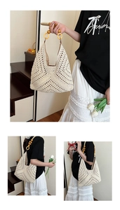Detail of crochet shoulder bag with hollow knit pattern and wood bead handle