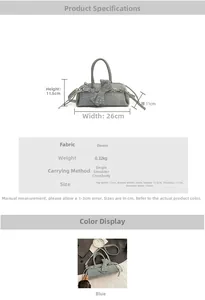 Detail of blue denim baguette bag featuring a stylish side bow and long shoulder strap