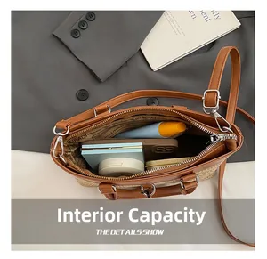 Internal capacity of straw tote bag showing phone, cosmetics and zip pocket storage