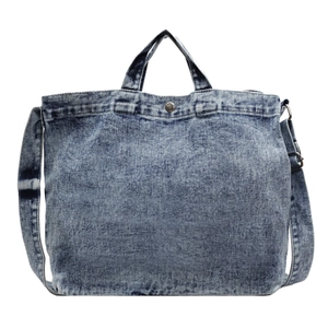 Retro denim tote bag in washed blue with adjustable shoulder strap and top handles