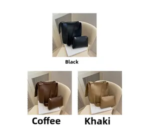 Three-color set of minimalist bucket bags with matching pouches and wide straps