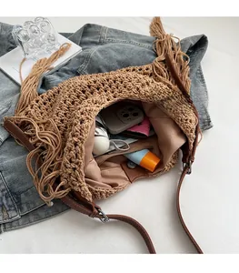 Detail view of woven tote interior showing spacious capacity for phone and cosmetics