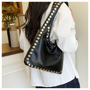 Black Hobo shoulder bag featuring large silver stud accents and premium faux leather finish