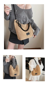 Detail of woven straw beach bag featuring unique black beaded handle and leather logo patch