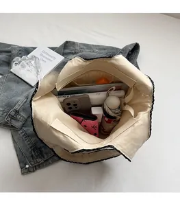 Top view of hollow woven tote bag interior showing large capacity for daily items