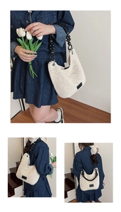 Detailed close-up of woven bucket bag featuring elegant black beaded handle and knit texture