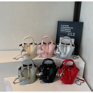 Mini bucket bags collection in six colors with litchi grain leather and heart charms