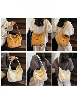Detailed views of high-capacity canvas shoulder bags in khaki and cream for daily use