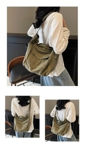 Detail view of army green canvas crossbody bag featuring vintage frayed edges and large pocket