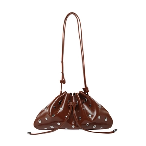 Brown leather crossbody bucket bag with silver stud rivets and a drawstring closure