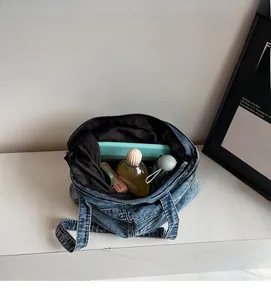 Top view showing the spacious interior and large capacity of the denim tote bag