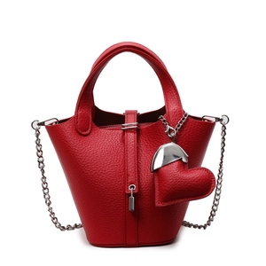 Minimalist red lychee grain leather bucket bag with silver lock and heart charm