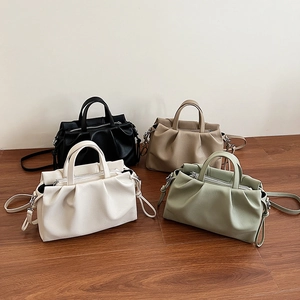 Chic pleated cloud crossbody bag in four soft colors including black and cream white