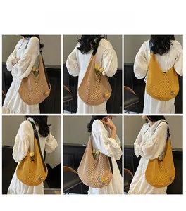 Lifestyle views of hollow woven tote bag with rainbow floral patches and leather straps
