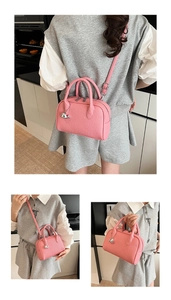 Pink litchi grain boston bag shown in crossbody and handheld styles for daily wear