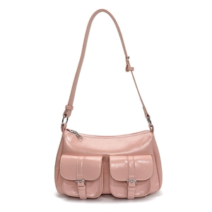 Pink glossy moto-style tote bag with dual front pockets and adjustable shoulder strap