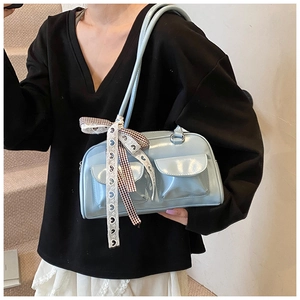Light blue patent leather bowling bag with vintage front pockets and silk scarf detail