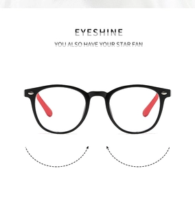 Close-up of flexible black oval eyewear frame showing the ergonomic temple design