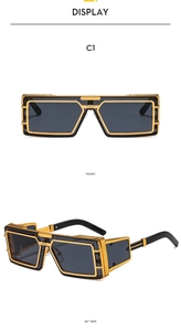 Détails macro des lunettes punk rectangulaires avec monture métal noir et or et rivets