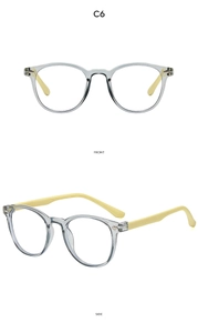 Close-up of kids light blue and yellow round eyeglasses with metal rivets detail