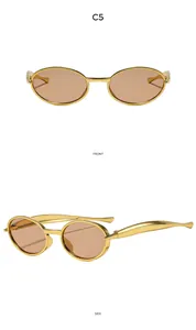 Vues avant et latérale de lunettes de soleil ovales dorées à double pont et verres bruns