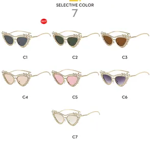 Collection of luxury rhinestone cat-eye sunglasses with gold frames in seven assorted colors