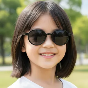 Classic round black sunglasses for children with dark protective lenses for outdoor activities