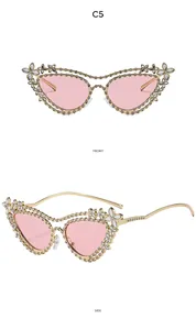 Detailed front and side views of luxury pink cat-eye sunglasses with rhinestone floral trim