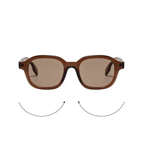 Close-up of translucent brown square frame sunglasses with silver metal hinge details