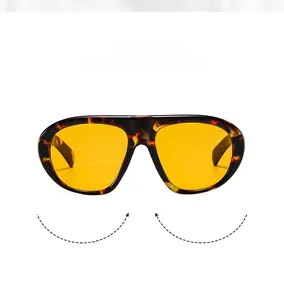 Détails de lunettes de soleil punk oversize avec monture écaille et verres jaunes
