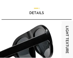 Détail des lunettes de soleil punk à monture noire épaisse avec une texture légère