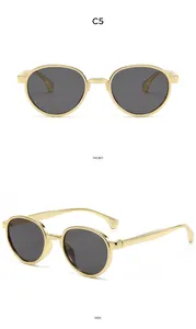 Detailed front and side views of vintage round gold metal kids sunglasses with dark lenses