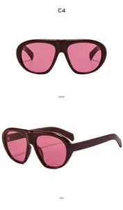 Vues de face et de profil de lunettes punk avec monture bordeaux et verres roses
