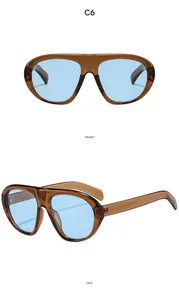 Vues de face et de profil de lunettes de soleil punk hip hop oversize avec verres bleus et monture brune