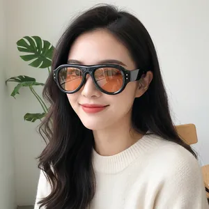 Retro oversized oval sunglasses with black frame and orange lenses for stylish outdoor protection