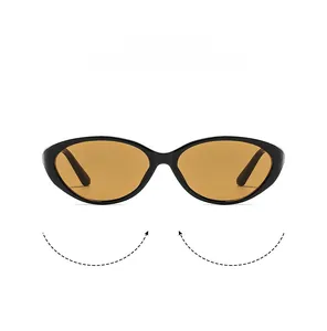 Detail of retro oval sunglasses with glossy black frames and orange translucent lenses
